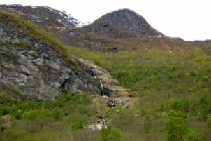 water streaming down from a mountain in Lunden, Norway