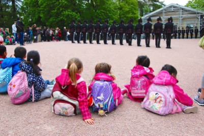 Princesses at the palace watching the changing of the guard. So cute!